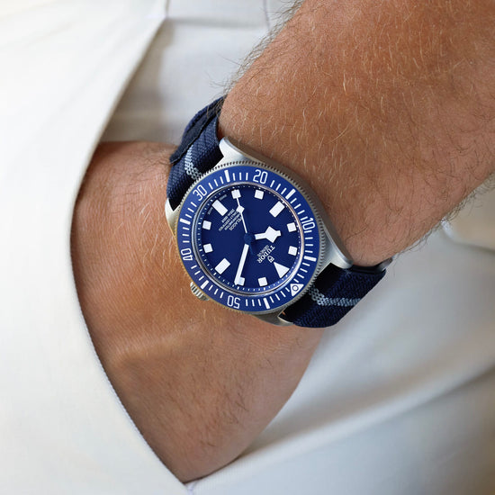 TUDOR Pelagos FXD M25707B/26-0001, 42mm titanium dive watch with navy blue dial and navy blue fabric strap
